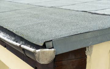 repair or replace Leafield flat roofing?